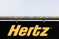 Hertz logo on a panel