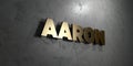 Aaron - Gold sign mounted on glossy marble wall - 3D rendered royalty free stock illustration