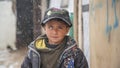 Poor Syrian Refugee Boy in a Refuge Camp at time of snow storm