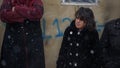 Poor Syrian Refugee Girl in a Refuge Camp at time of snow storm