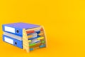 Abacus on stack of ring binders Royalty Free Stock Photo