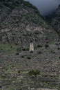 The Abai-Kala Tower in the Cherek Gorge in the North Caucasus in Russia. Cloudy day June 9, 2022