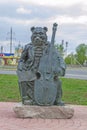 Abakan, Russia 05/02/2020: Bronze monument, Bear with double bass and musical notes