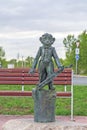 Abakan, Russia 05/02/2020: Bronze monument. Monkey in tailcoat with double bass and musical notes