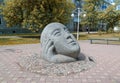 Abakan, Russia. The sculpture is a dreamer. The head of an oriental man in the palm of his hand