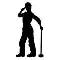 silhouette of a female worker holding her sledge hammer.