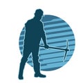 silhouette of a worker using mattock