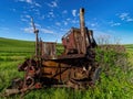 Abandon combine in a Palouse wheatfield