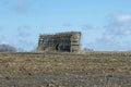 An Abandonded Corn Crib in a Field Royalty Free Stock Photo