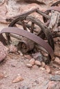 Abandondes broken wagon wheel in caligo ghost town, USA Royalty Free Stock Photo