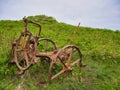 Abandoned agricultural machinery on the island of Benbecula in the Outer Hebrides, Scotland, UK.