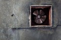 Abandoned air conditioning duct and rusted fan Royalty Free Stock Photo