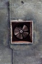Abandoned air conditioning duct and rusted fan Royalty Free Stock Photo