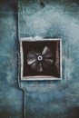 Abandoned air conditioning duct and rusted fan Royalty Free Stock Photo