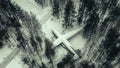 Abandoned aircraft in the winter forest.