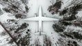 Abandoned aircraft in the winter forest.