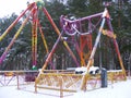 Abandoned amusement park in winter time Royalty Free Stock Photo