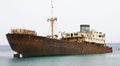 Abandoned and anchored ship in the port of Los MÃÂ¡rmoles, Arrecife, Lanzarote