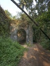 Abandoned ancient entrance gate of Revdanda Fort near Alibag