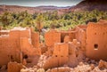 Ancient kasbah ruins and palm trees in Tinghir Morocco