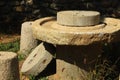 Abandoned ancient millstone