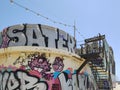 Abandoned bar on Barcelona beach breakwater, detail of the old rusty metal staircase