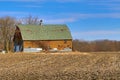 Abandoned Barn with Shingles as Siding