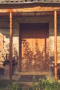 Abandoned barn vintage wooden door. Old photo of rustic house entrance Royalty Free Stock Photo