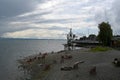 Abandoned beach with empty plastic chairs on Lake Constance in Friedrichshafen in Germany.