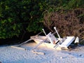 An Abandoned Beached Boat on Tropical White Sands