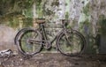 Abandoned bicycle leaning against a wall Royalty Free Stock Photo