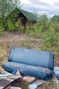 Abandoned blue vinyl bench seat