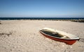 Abandoned boat on beach