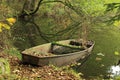 Abandoned boat on the forest pond Royalty Free Stock Photo