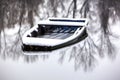 Abandoned boat frozen in a lake