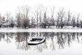 Abandoned boat in a frozen lake