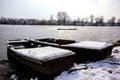 Abandoned boat frozen in a lake