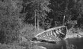 Abandoned broken boat on the river. Black and white image Royalty Free Stock Photo