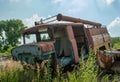 Abandoned broken old fire station truck during summer in the lost forgotten village Royalty Free Stock Photo