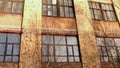 Abandoned building with broken windows in winter