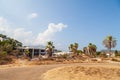 Abandoned building exterior view of Hotel in the Turkish village of kemer with broken windows and overgrown plants Royalty Free Stock Photo