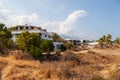 Abandoned building exterior view of Hotel in the Turkish village of kemer with broken windows and overgrown plants Royalty Free Stock Photo