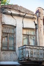 Abandoned building facade shows cracks and urban deterioration Royalty Free Stock Photo