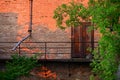 Abandoned Building Metal Walk Way With Drainage Pipe Across