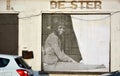 Abandoned building with realistic picture of a Woman