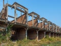 Abandoned building by side perspective of unfinished house with degenerate structure detail