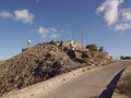 View of a closed and abandoned military base on the mountain of the Prophet Elijah, Santorini island Greece. Royalty Free Stock Photo