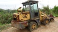 An abandoned bulldozer, some areas have rusted