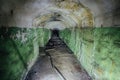 Abandoned bunker tunnel with concrete walls Royalty Free Stock Photo