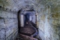 Abandoned bunker tunnel with concrete walls Royalty Free Stock Photo